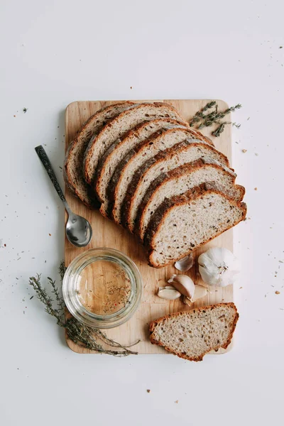 Baking Wooden Background Fresh Sliced White Bread Oil Olives Spices — Stock Photo, Image