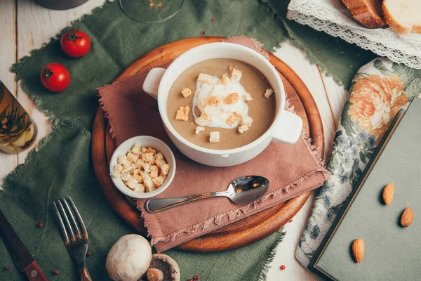 Flatley composition with a dish from a restaurant. Mushroom soup puree with bread croutons. — Stock Image Flatley Composition Dish Restaurant Mushroom Soup Puree Bread Croutons Stock Photo