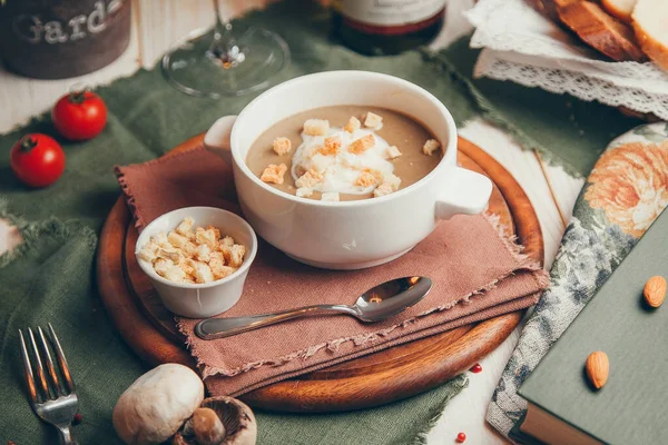 Flatley composition with a dish from a restaurant. Mushroom soup puree with bread croutons. — Stock Image Flatley Composition Dish Restaurant Mushroom Soup Puree Bread Croutons Stock Image