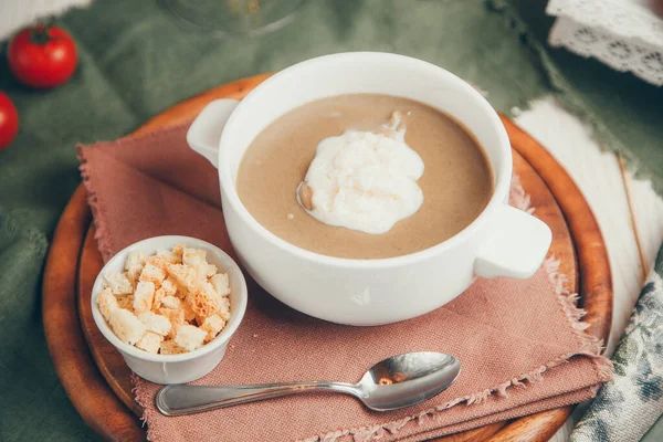 Flatley composition with a dish from a restaurant. Mushroom soup puree with bread croutons. — Stock Image Flatley Composition Dish Restaurant Mushroom Soup Puree Bread Croutons Stock Image