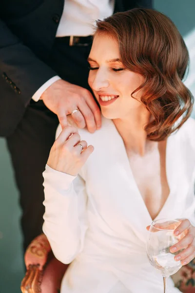 Stylish European wedding. Modern trends in the image of the bride. Bright portrait of the bride in the interior Studio.