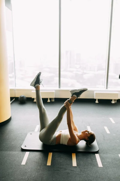 Flexibility Exercises Black Background Stretching Dark Room Rug Beautiful Girl — Stok fotoğraf