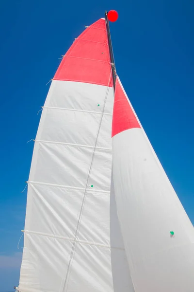 Colorful sails on the beach — Stock Photo, Image
