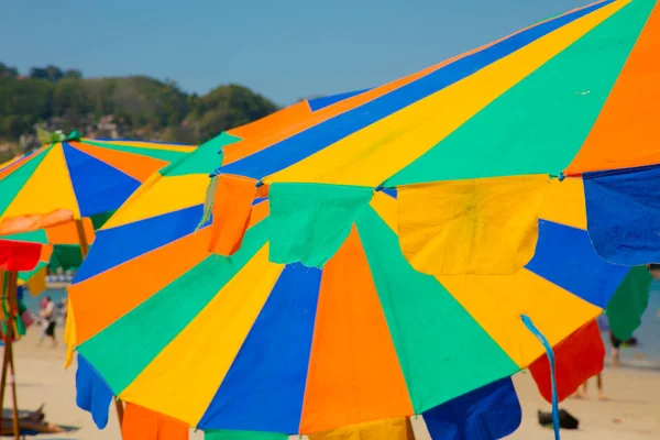 Colored umbrellas on the beach