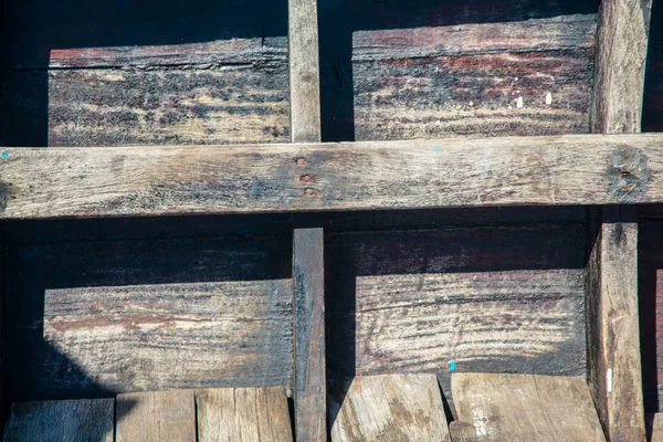 Junta de un viejo barco de madera iluminado por el sol —  Fotos de Stock