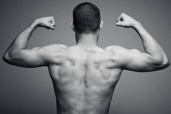 Schiena muscolosa degli uomini — Foto Stock
