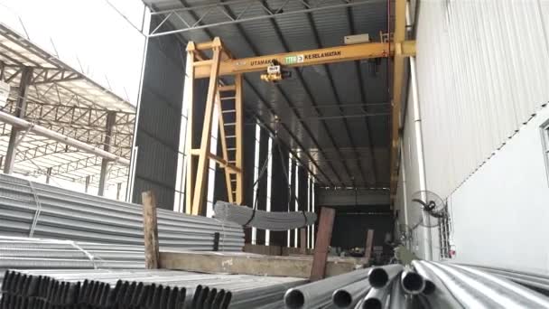 Carrying Aluminum Duct Pipes Crane Warehouse — Stock Video