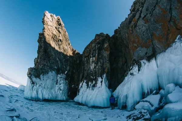 Man in an ice cave on Baikal