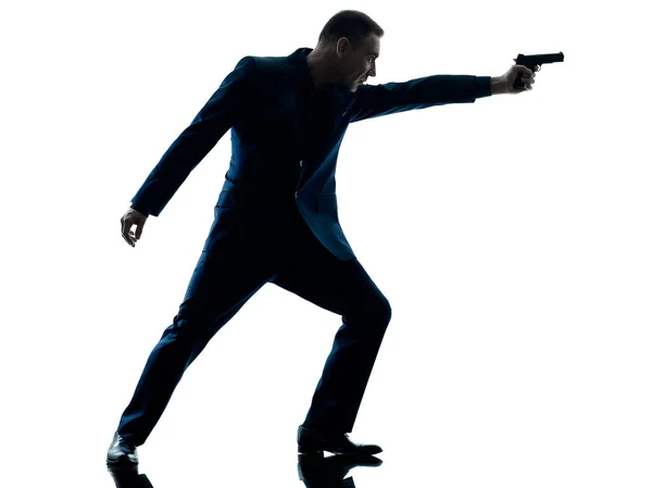 Muž s pistole silueta izolované — Stock fotografie