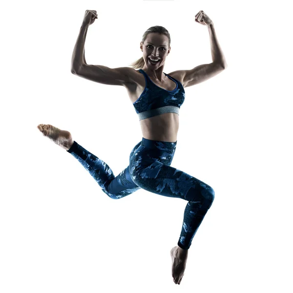 Женщина фитнес упражнения прыжки силуэт — стоковое фото