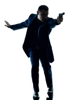 izole bir tabanca siluet adamla