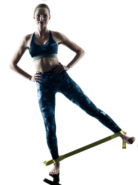 Mulher fitness elástico excercises silhueta — Fotografia de Stock