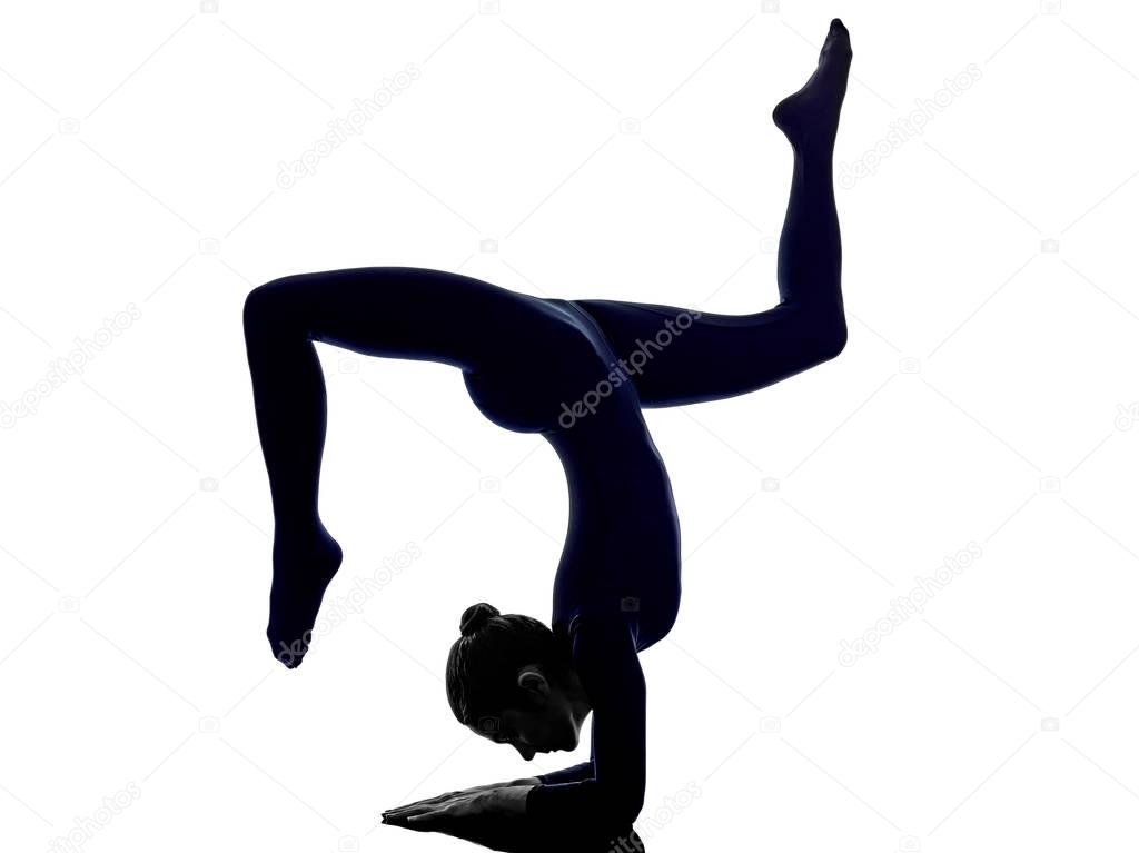 woman exercising Eka Pada Viparita Dandasana pose yoga silhouett