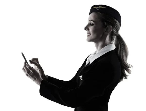 Стюардесса бортпроводница на телефоне изолированный силуэт — стоковое фото