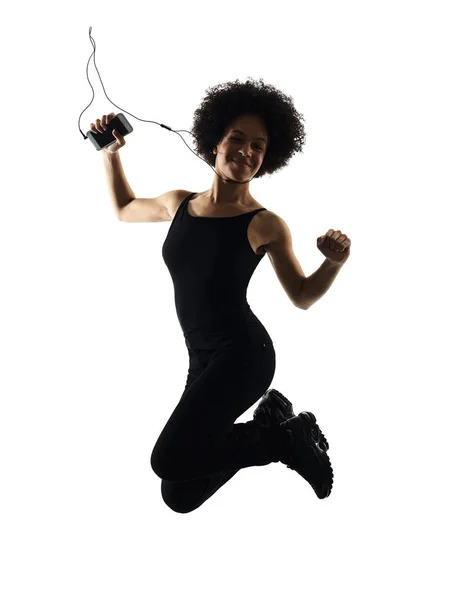 Joven adolescente chica mujer feliz bailarina bailando escuchar música i —  Fotos de Stock