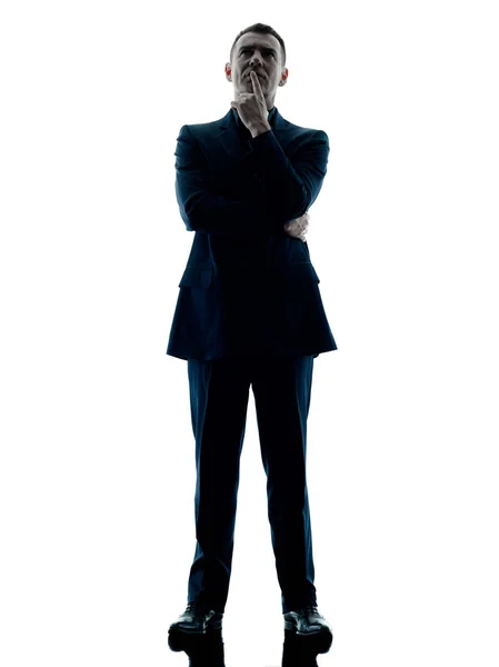 Biznes człowiek stojący myślenia na białym tle — Zdjęcie stockowe