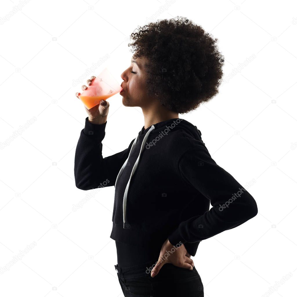 young teenager girl woman drinking orange juice shadow isolated