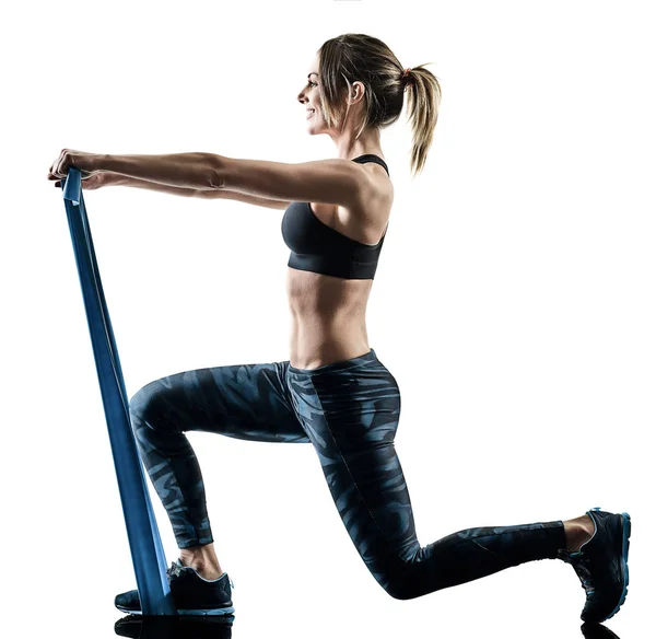 Mujer pilates fitness elástico resistente banda ejercicios silueta —  Fotos de Stock