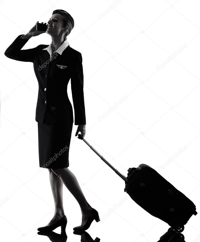 Stewardess cabin crew woman on the phone isolated silhouette 