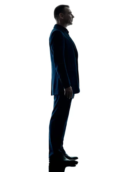 Biznes człowiek stojący sylwetka na białym tle — Zdjęcie stockowe