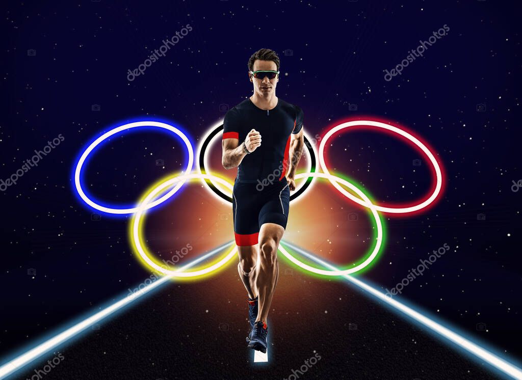 Runner running with olympic games rings logo on isolated black background