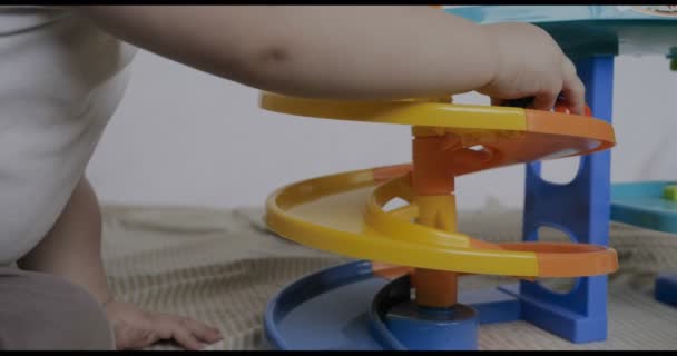 Little Baby Boy Sits Playing Toy Cars White Background Concept — Stock Video