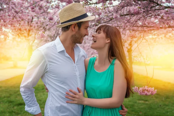 Springtime couple with blossom — Stock Photo, Image