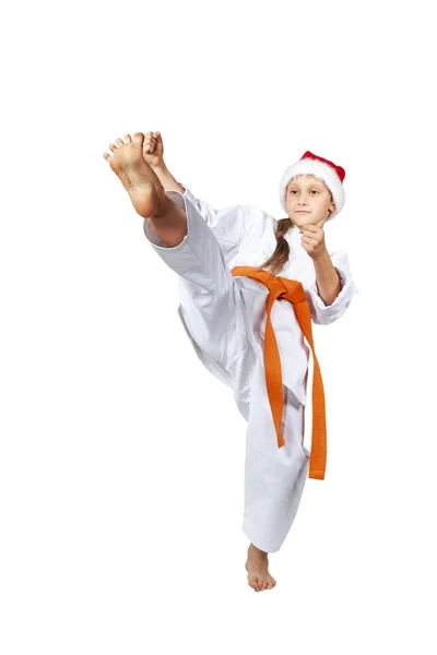 Vysoká kop vpřed bije karatista v karategi — Stock fotografie