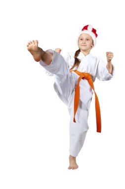 Karateka Noel Baba şapkalı bir tekme bacak ileri hits