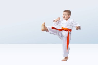 Kick leg is beating small athlete clipart