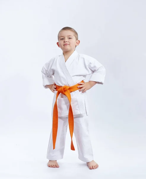 With orange belt athlete on a white background — Stock Photo, Image