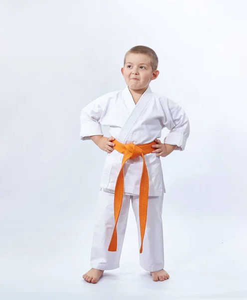 Karateka with orange belt on white background — Stock Photo, Image