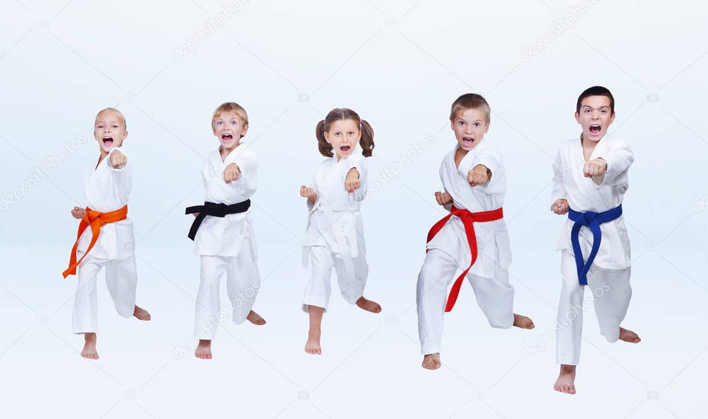 Sportsmen in karategi are beating punch arm