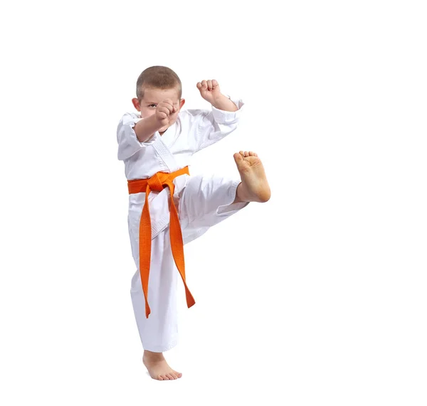 With orange belt boy beats kicking — Stock Photo, Image