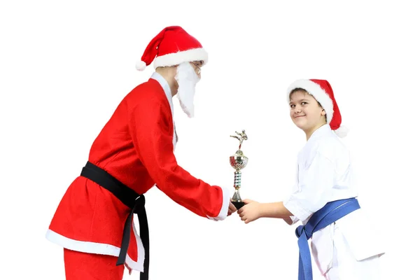 Vit Bakgrund Jultomten Med Svart Bälte Presenterar Utmärkelse Till Liten — Stockfoto
