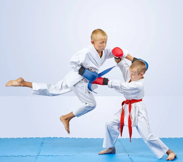 Blue Overlays Hands Athlete Hits Punch Jump — Stock Photo, Image