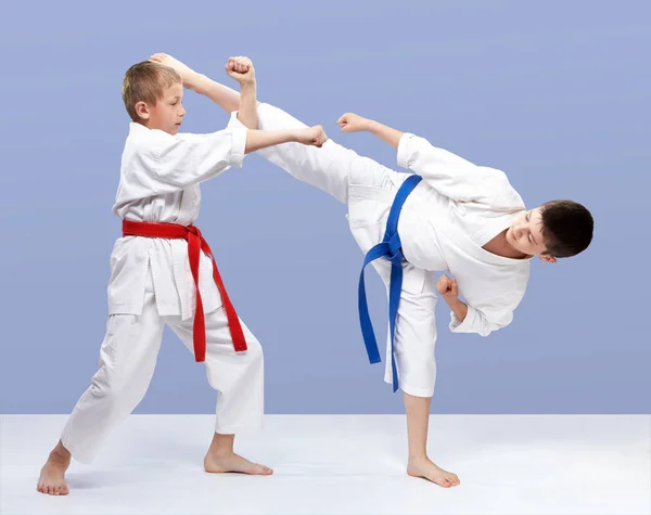 Red Blue Belt Boys Training Strikes Blocks — Stock Photo, Image