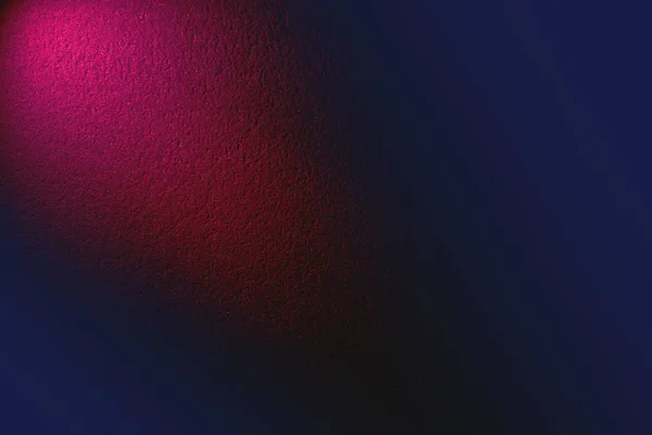 Dark blue background with a pink glow in the middle