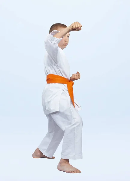 Orange Belt Karateka Boy Beats Punch Arm — Stock Photo, Image