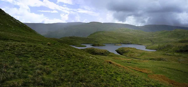 Angle Tarn and the fells — Free Stock Photo