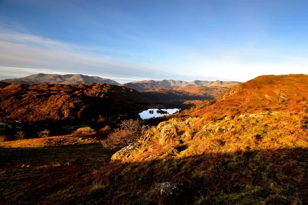 Światło słoneczne na Loughrigg Fell — Zdjęcie stockowe