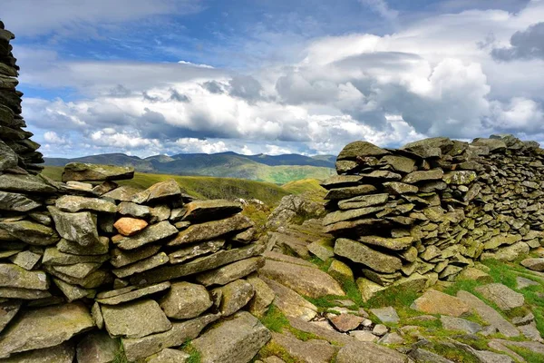 Zonlicht over de Ullswater fells Rechtenvrije Stockafbeeldingen