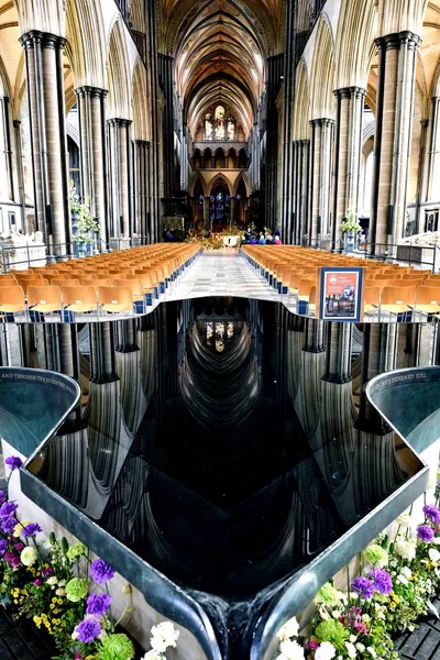 Reflections in the cathedral font — Stock Photo, Image