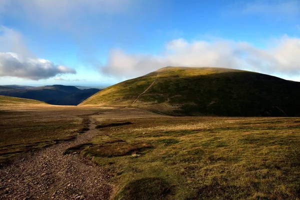 Téli napfény a Grasmoor csúcsán — Stock Fotó