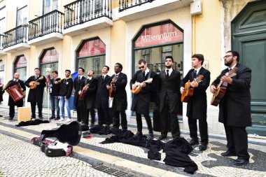 Lisbon, Portugul - 25th April 2019:Group of male entertainers singing in the Lisbon Street