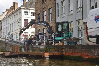 Bruges, Belgium - 29th April 2019:Construction works repairing the canal structure