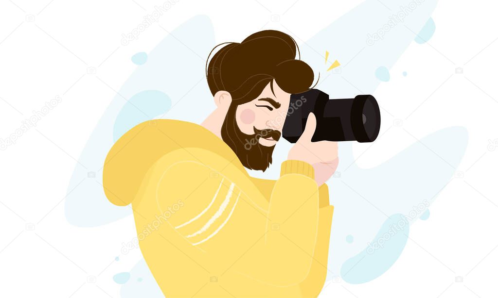 Professional photographer with camera taking photo isolated on white. Young bearded man looking for a good frame view.