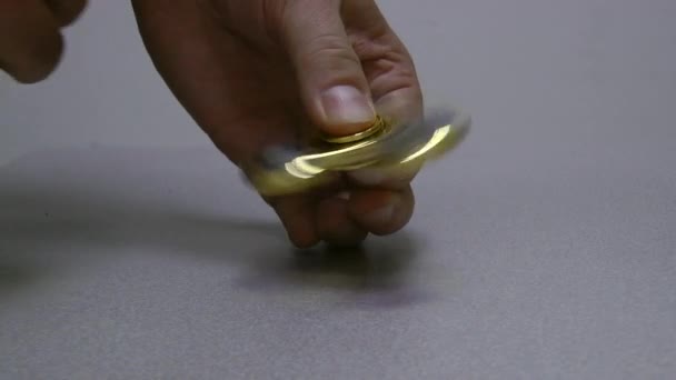 Gold spinner rotate on the white background. — Stock Video