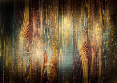 Çizik ve çatlaklarla dolu eski ahşap doku.