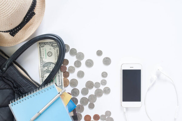 Flat lay of travel concept with hand bag, money, credit card, mo